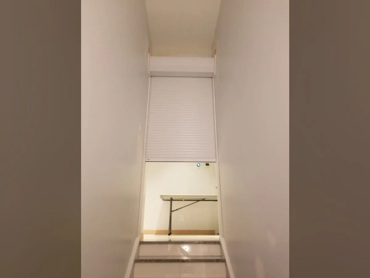 Stairwell shutter halfway open