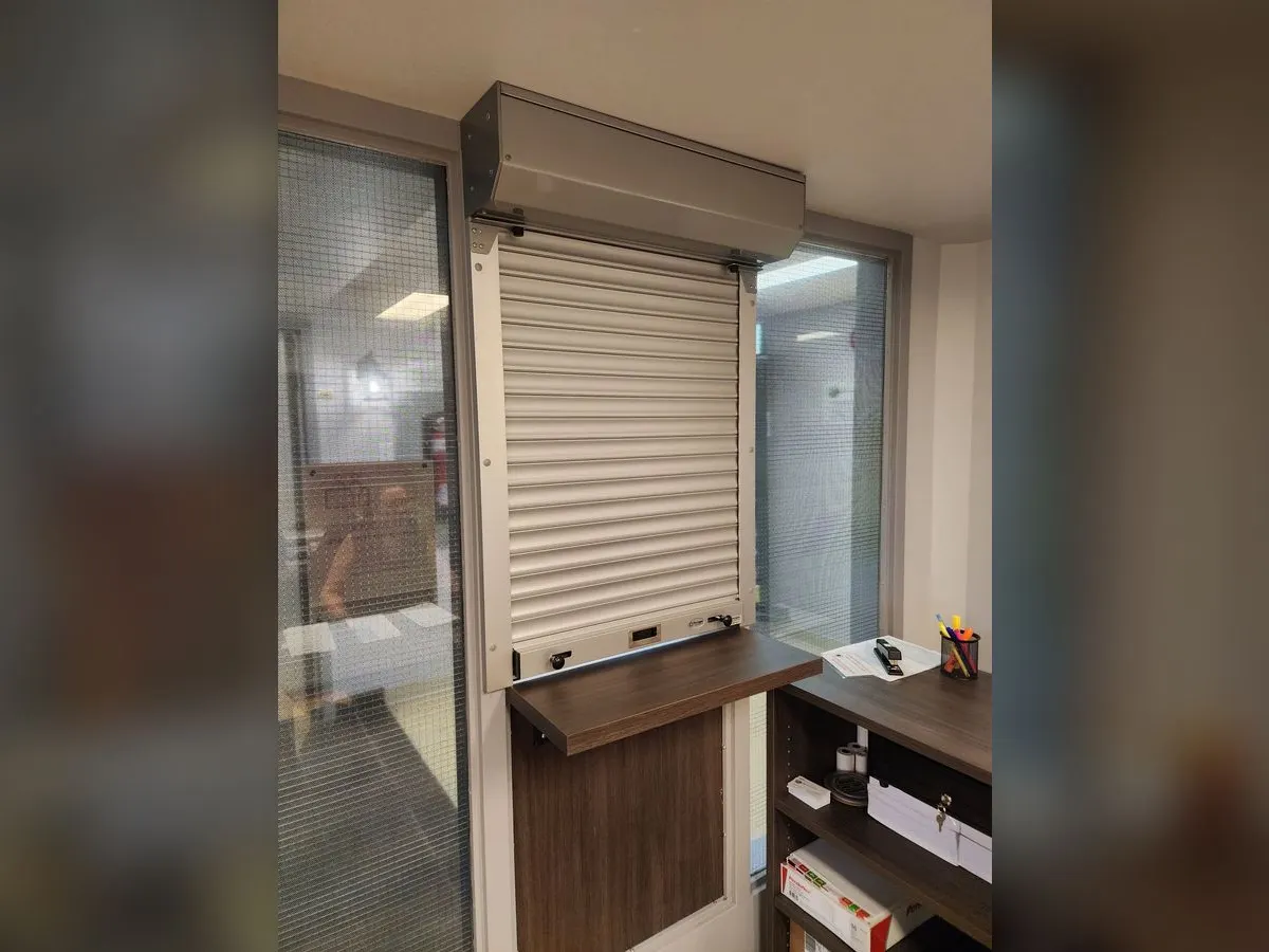 Reception counter with a shutter
