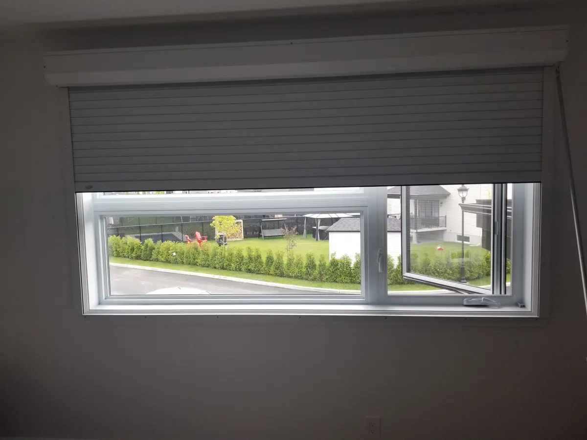 Interior shutter halfway down a window