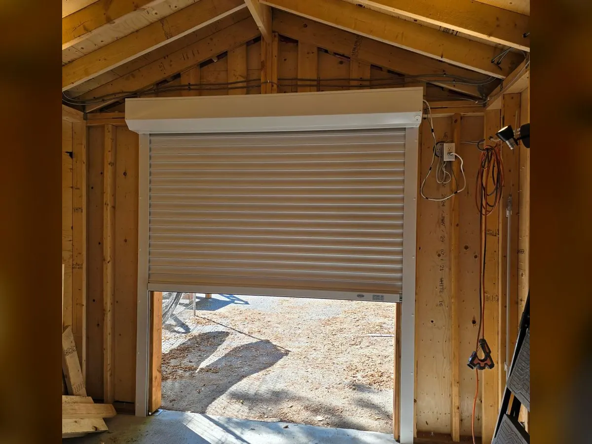 Roll-up door seen from inside a garage