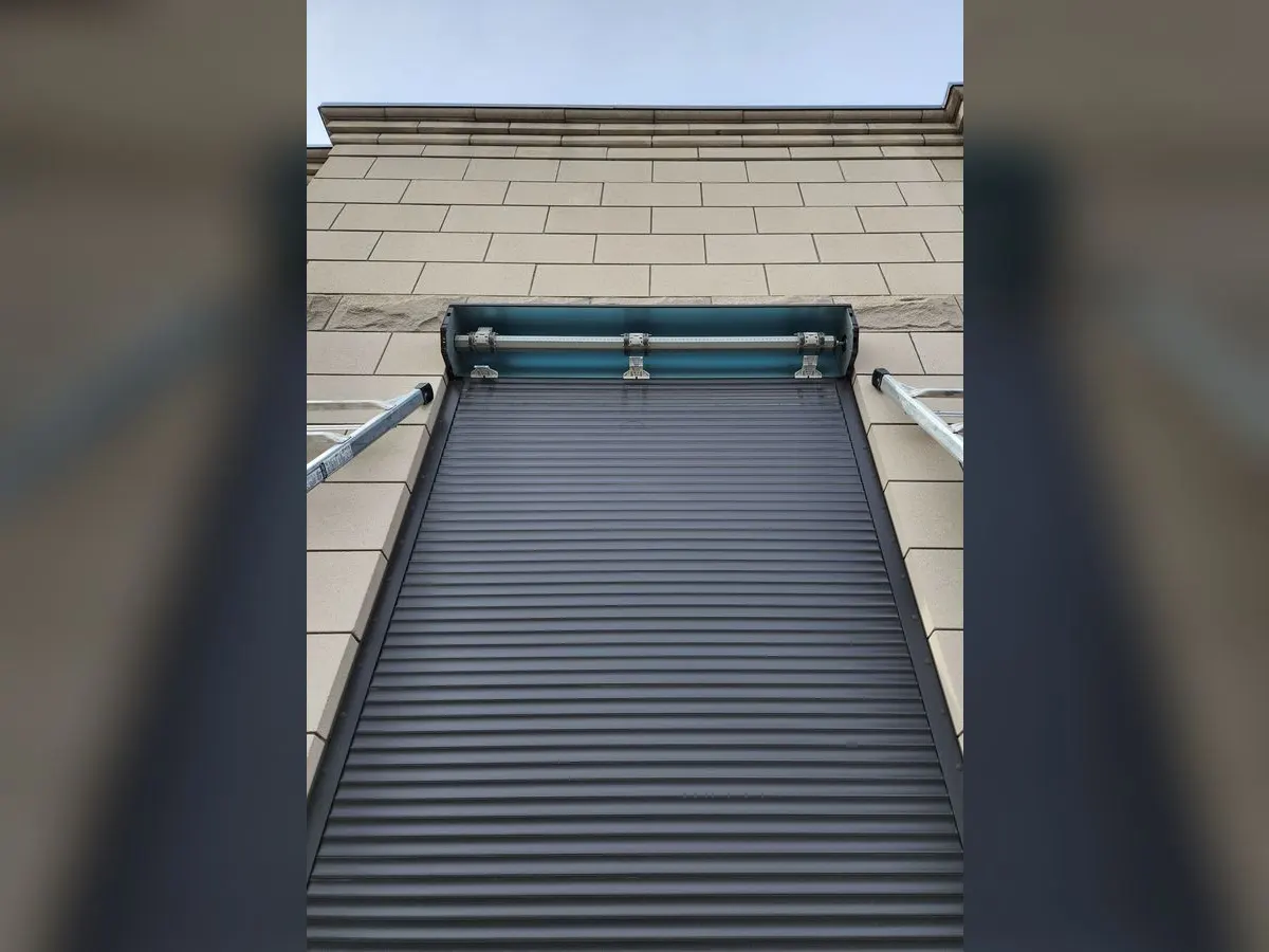 Shutter during installation, box still under protective film