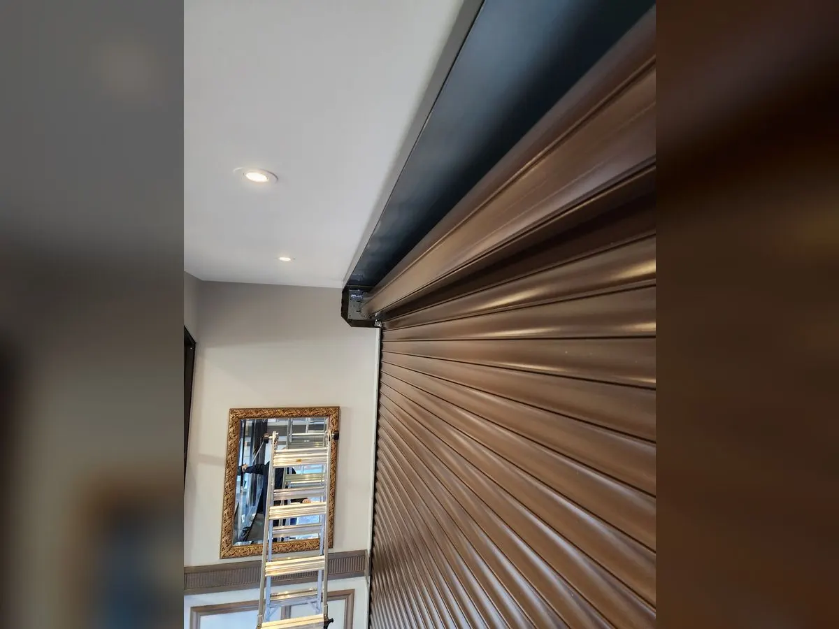 Interior shutter with a wood finish